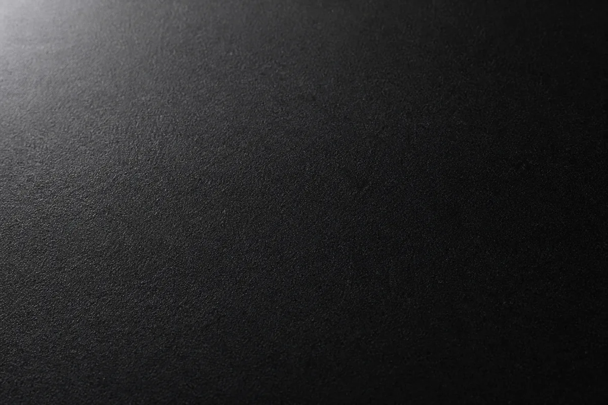 Uniform honed Absolute Black granite slab with a matte finish