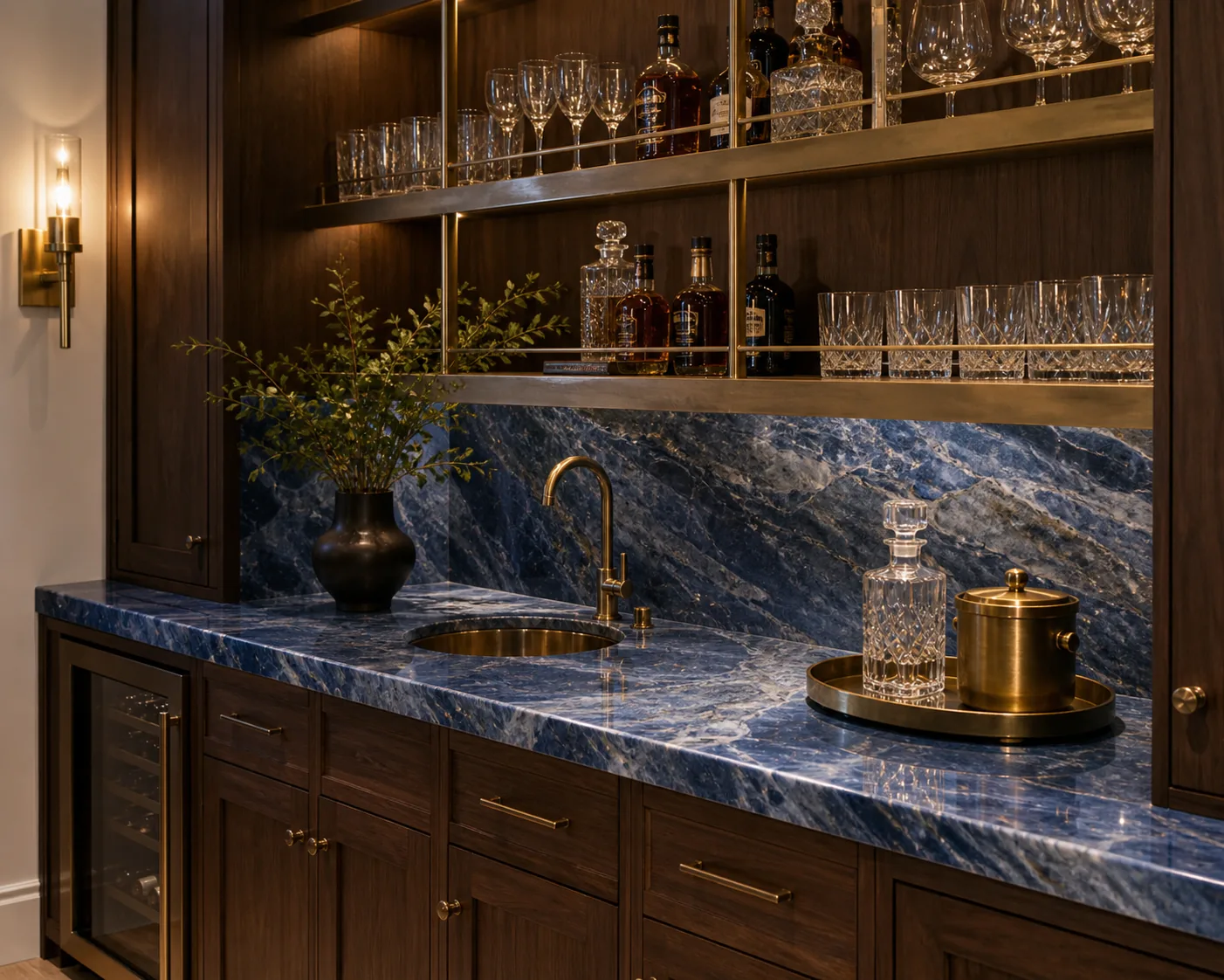 Home wet bar with blue quartzite countertop and walnut cabinetry