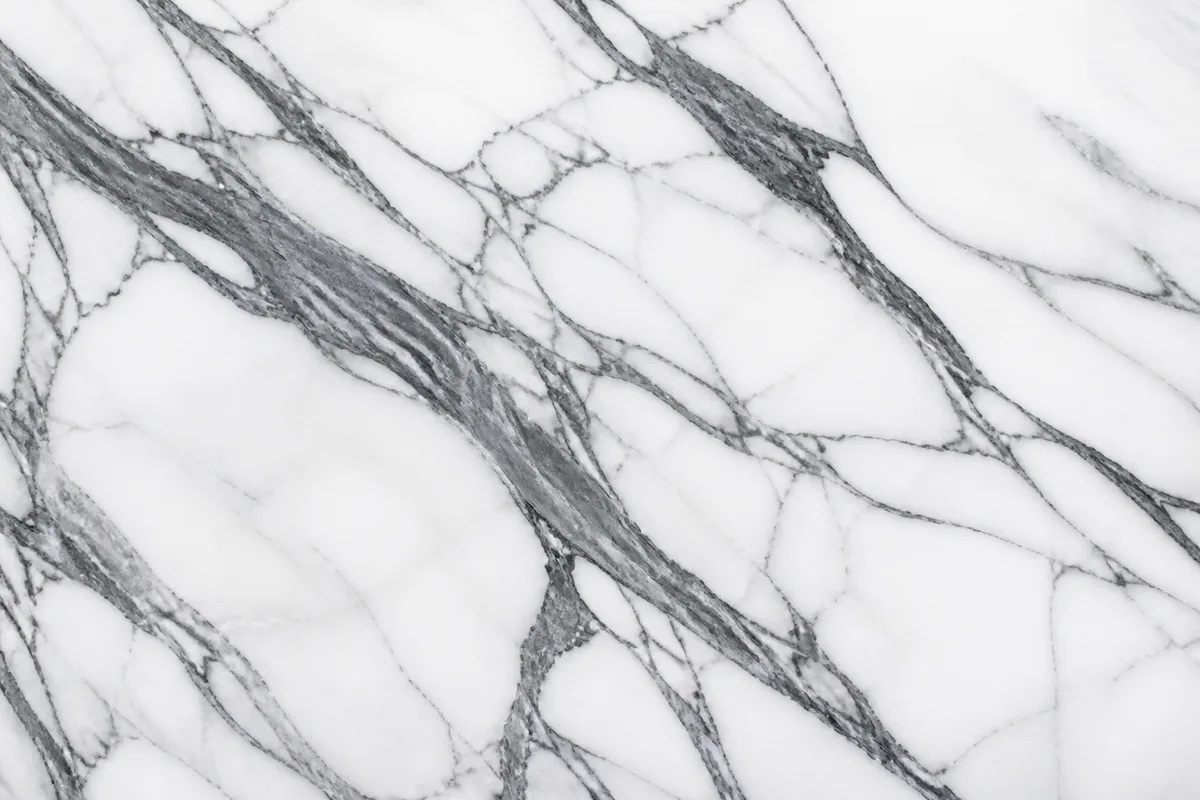 White Statuario Venato marble slab with sharp gray veining